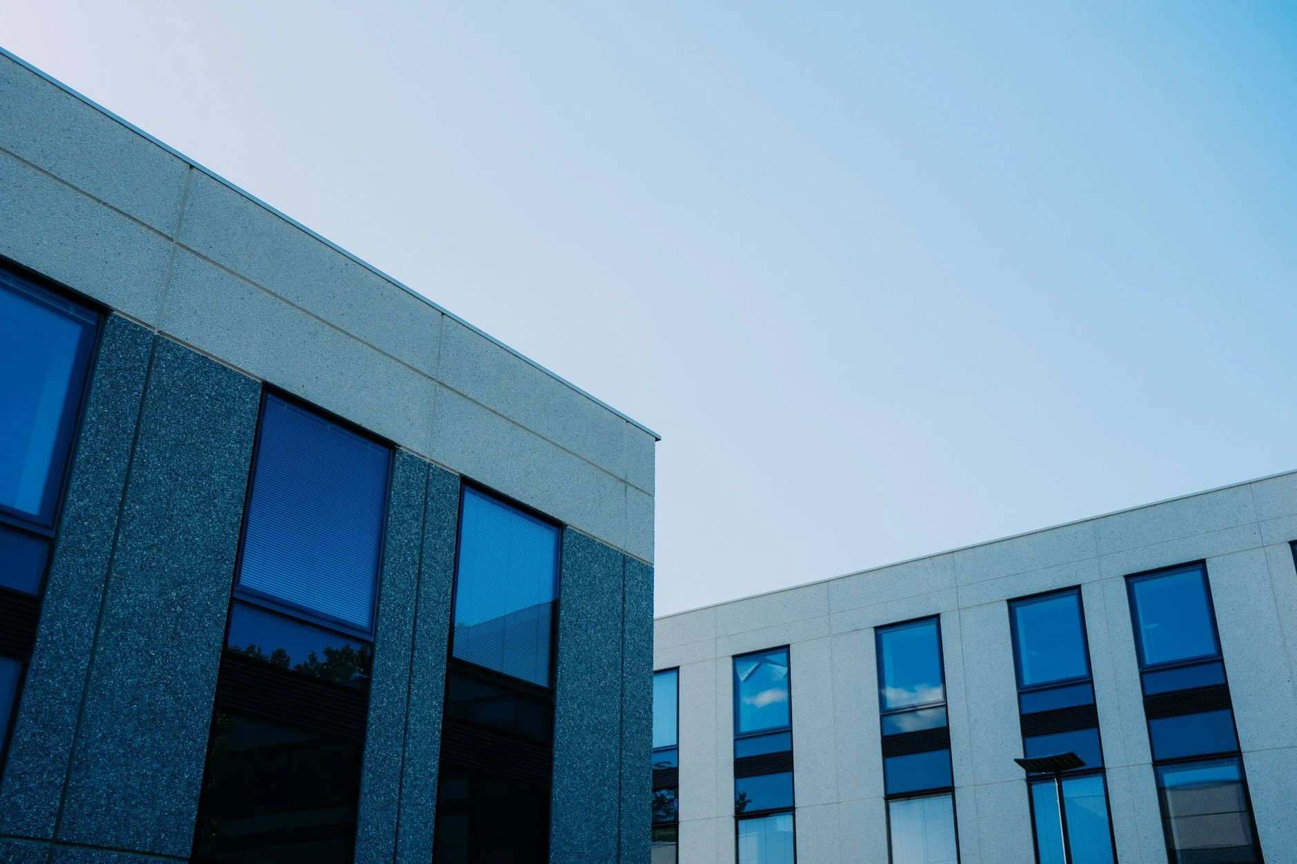 ** Modern commercial property representing corporate loan against property funding.